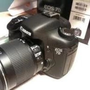  Canon EOS 7D Digital SLR Camera with EF-S 18-135mm IS lens: $1000